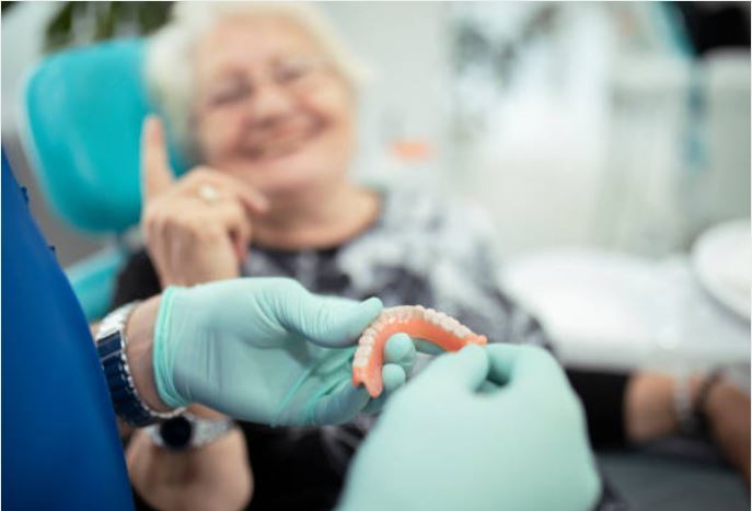 lady-in-chair-with-dentures